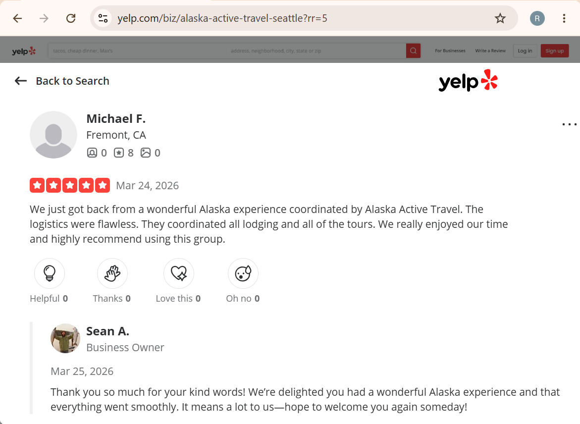Screenshot of a Yelp review for Alaska Active Travel by Michael F. from Fremont, CA, giving five stars and praising the flawless logistics and coordination of tours and lodging.